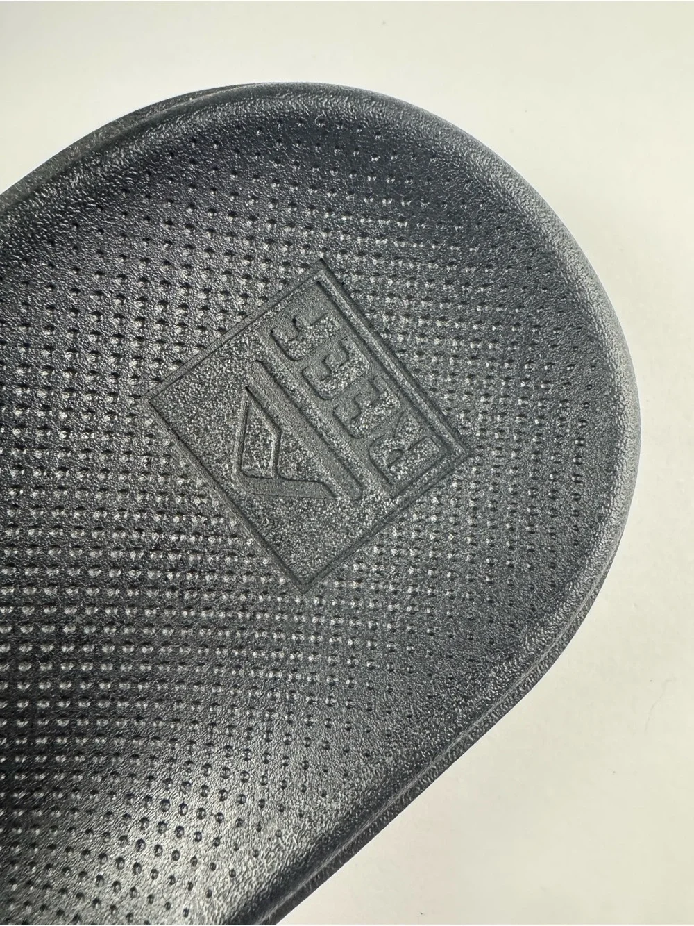 Reef Men's Brown and Black Leather-Style Flip Flops